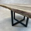 Couchtisch aus versteinertem Holz
